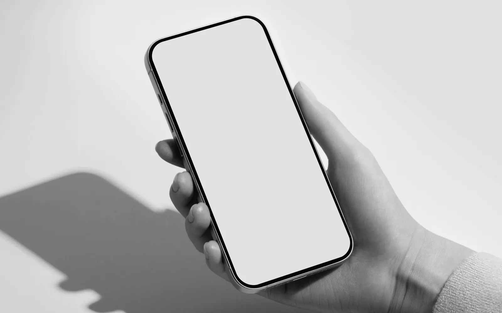 A hand holding a phone showing a Krypton mandate for an agent
